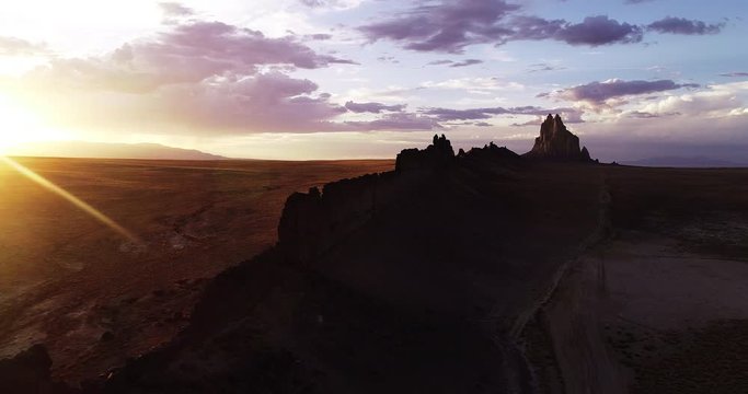 View Of Ship Rock From Mountain Ridge In Desert, Wide Aerial