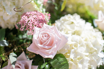 Beatiful pink roses and white hydrangea bridal bouquet close up