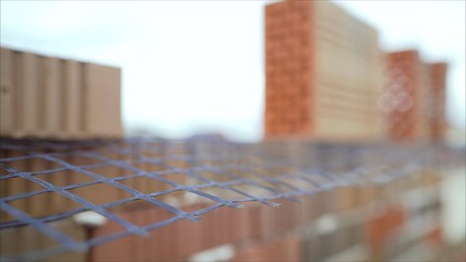 construction worker. Portrait of mason bricklayer installing red brick with trowel putty knife...