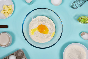 Background with baking ingredients. Flat lay. View from above.