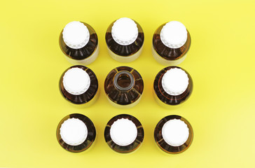 Medical bottles on a yellow background