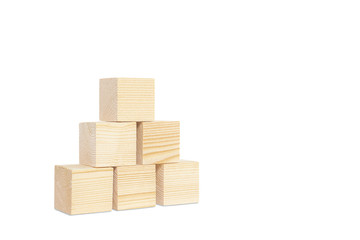 Obraz premium Blank wooden blocks on a stone countertop. The concept of content supplementation, several wooden cubes possible to enter content, place icons.