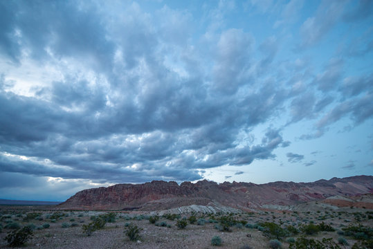 A cloudy evening sky over Bitter Ridge during Blue Hour After Sunset in Gold Butte National Monument, Clark County, NV, USA