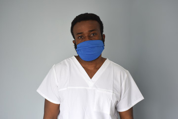 Black african american man doctor  in medical mask. Coronavirus is around. People who saves themselves. Pandemic. 
