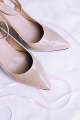beige patent stiletto shoes