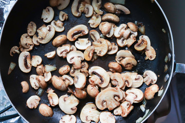 frying pan with mushrooms