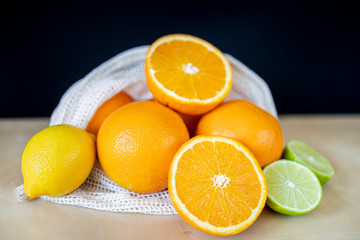 Cotton bag with some citrus inside. Zero waste bag.