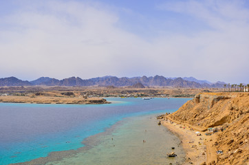 Sharm El Sheikh Bay panorama with amazing water color. Red sea