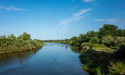 Wide river Klyazma in the middle of Russia in the hot summer.