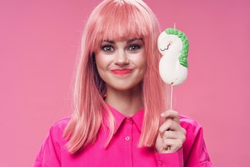 young woman with a lollipop