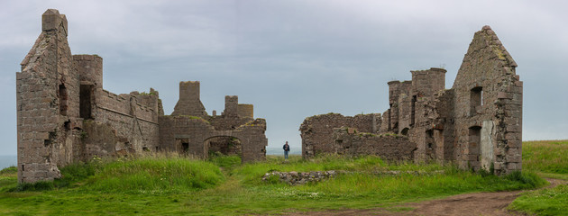 ruins of castle on scottish coast panorama