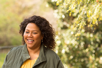 Beautiful mature African American woman smiling and laughing.