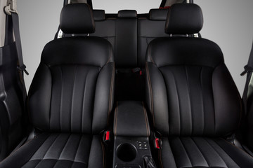 the interior of the car is covered with handmade genuine leather. View from the windshield. The back doors are cut from the photo. High-quality stitching