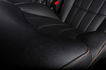 the interior of the car is covered with handmade genuine leather. front car seat. the view from the...