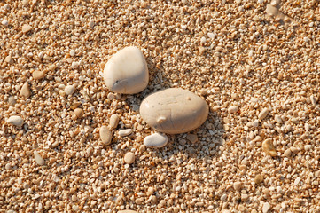 two stones in the sand