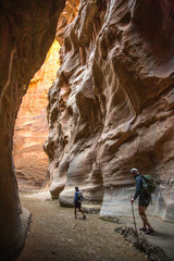 photographers hiking in the Narrows, Zion UT