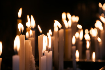 candles lit in a catholic church
