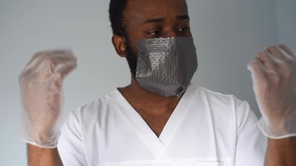 Black african american man doctor  in medical mask. Coronavirus is around. People who saves themselves. Pandemic.  - Powered by Adobe