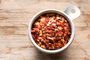 Red pepper Flakes in  Measuring Cup
