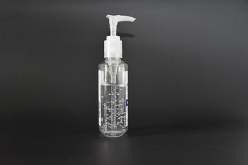 hand sanitizer side view black background isolated clear