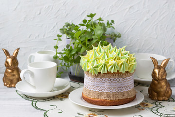 Easter decoration. Easter cake decorated with whipped cream.
