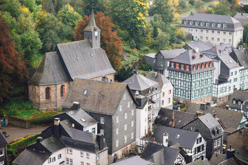 Fototapeta na wymiar cloudy autumn panorama of the old city. Monschau, Germany.