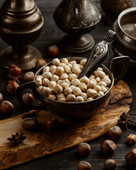 a vintage bowl of roasted hazelnut