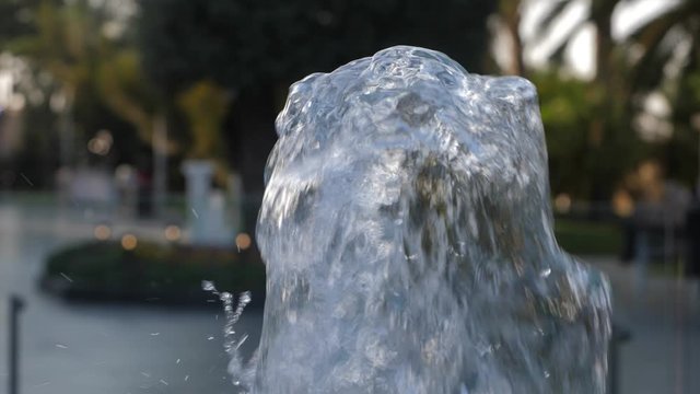 Small city Blur  fountain on a sunny spring day