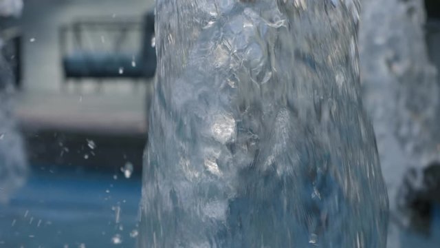 Small city Blur  fountain on a sunny spring day
