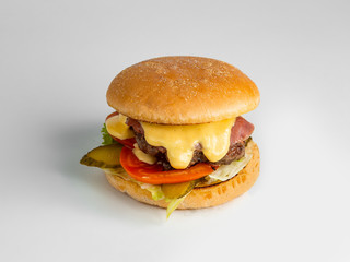mini beef burger with salami tomato prickled cucumber lettuce and cheese