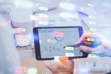 Multi exposure of man's hands holding and using a digital device and data theme drawing. Innovation concept.