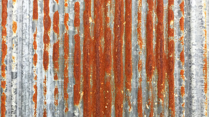 Rust on Galvanized corrugated sheet, rustic background, weathered background. Metal sheet with rusty.