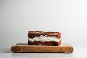 Ice cream sandwich with banana bread and vanilla ice cream