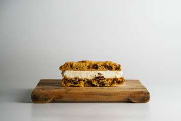 Ice cream sandwich with chocolate chip cookies and vanilla ice cream