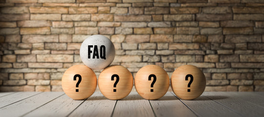balls with questionmarks and text FAQ in front of a brick wall