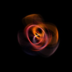 Spinning rays of light isolated on black background. Graphic 2D illustration of glowing colorful light particles in circular motion.