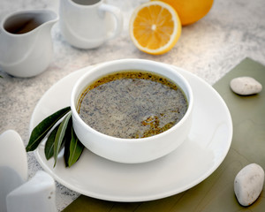 traditional azerbaijani dumpling soup dushbara garnished with dried mint leaves