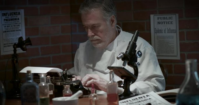 A Medical Scientist From 1918 In A Private Laboratory During The Spanish Flu Influenza Pandemic Documenting His Findings Using A Typewriter.