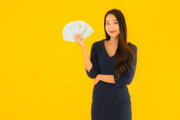 Portrait beautiful young asian woman with money and cash