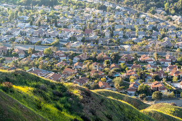 Mountain slopes and valley homes in the Granada Hills area of north Los Angeles, California.  