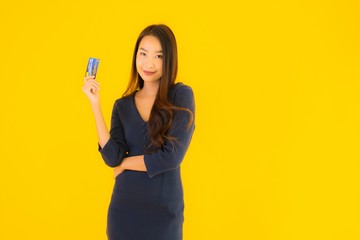 Portrait beautiful young asian woman with credit card