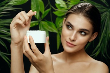 young woman with a glass of milk