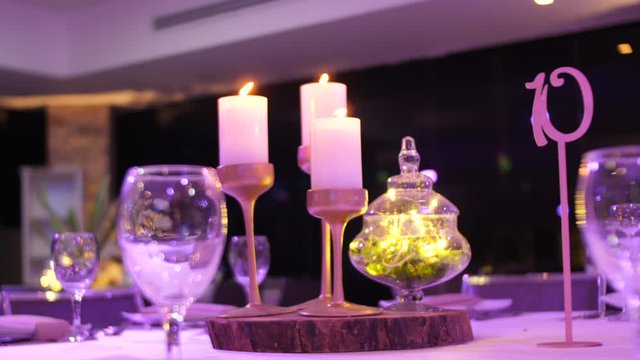 Beautiful restaurant interior table decoration for wedding or event. Flower , gless Wedding Table Decoration/ Autumn colors