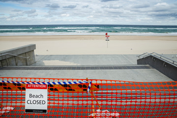  Surfers Paradise beach closed, covid-19 virus, beach closed or shutdown concept amid coronavirus fears. 2019-ncov force Queensland government to lockdown iconic beach to help stop the spread of virus