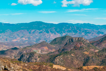 Obraz premium Panoramic view of mountains on blue sky