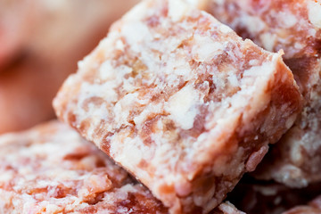 Closeup of frozen beef cube steak texture