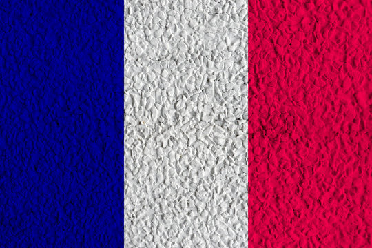 Grunge Flag of France. old dirty wall or grunge background