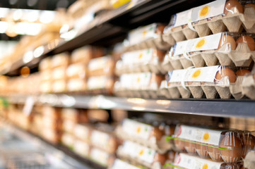 Preparing egg grocery store shelves as hoarding food, For the Corona Virus (Covid-19) outbreak crisis.