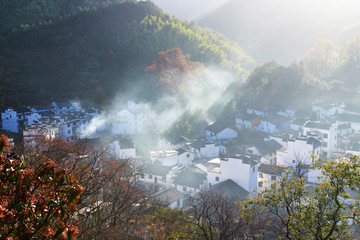 The morning fog on the dwellings of Anhui buildings in Wuyuan county Jiangxi province, China.