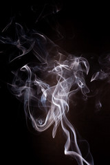 Fototapeta premium Smoke motion on black background.